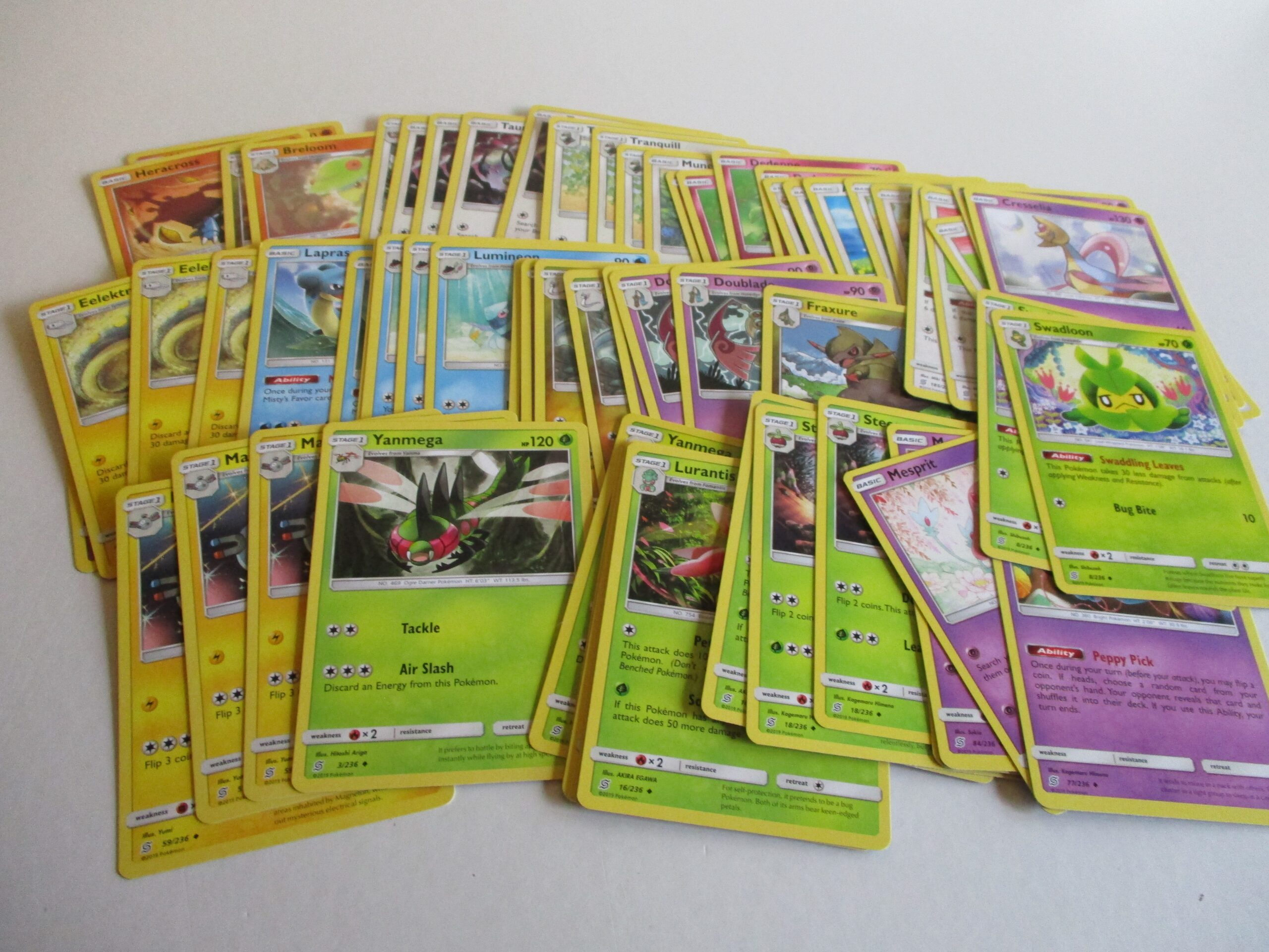Pokémon, Unified Minds, lot van 61 Uncommons, near mint